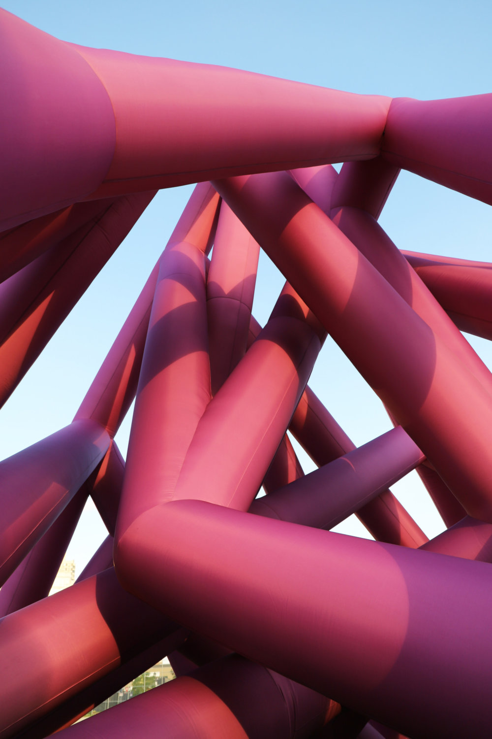 Immersive Pyramid Installations Formed Of Giant Inflatable Pink Tubes And Spheres Designed By Cyril Lancelin 3