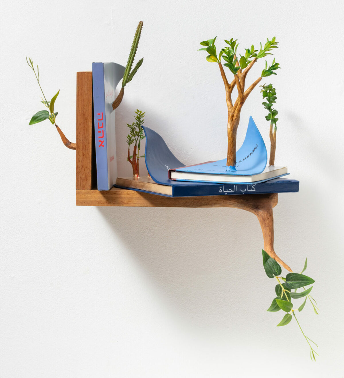 Art And Nature Humorous Wooden Sculptures With Sprouted Wooden Limbs By Camille Kachani 10