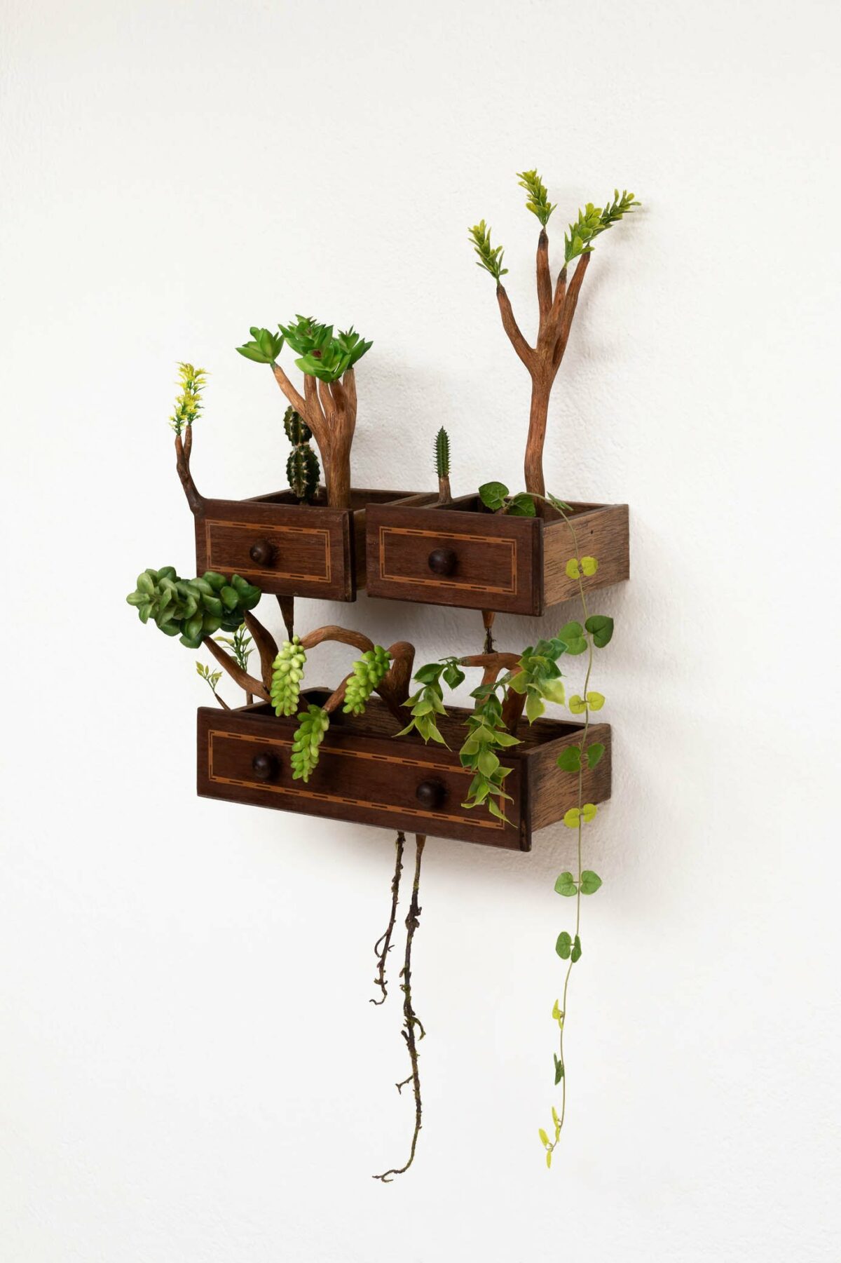 Art And Nature Humorous Wooden Sculptures With Sprouted Wooden Limbs By Camille Kachani 5