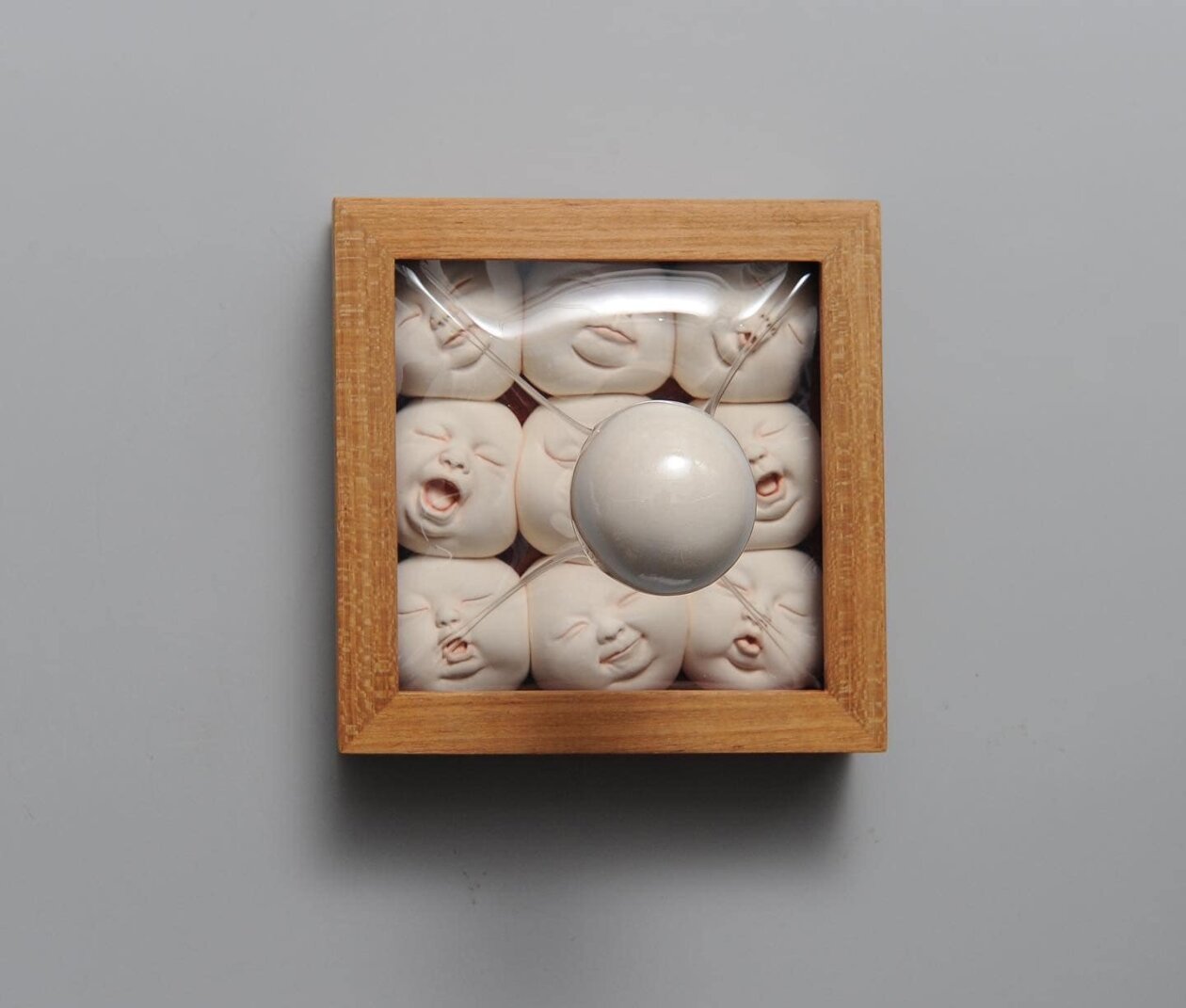 Distorted Baby Faces, Surreal Ceramic Sculptures By Johnson Tsang (13)