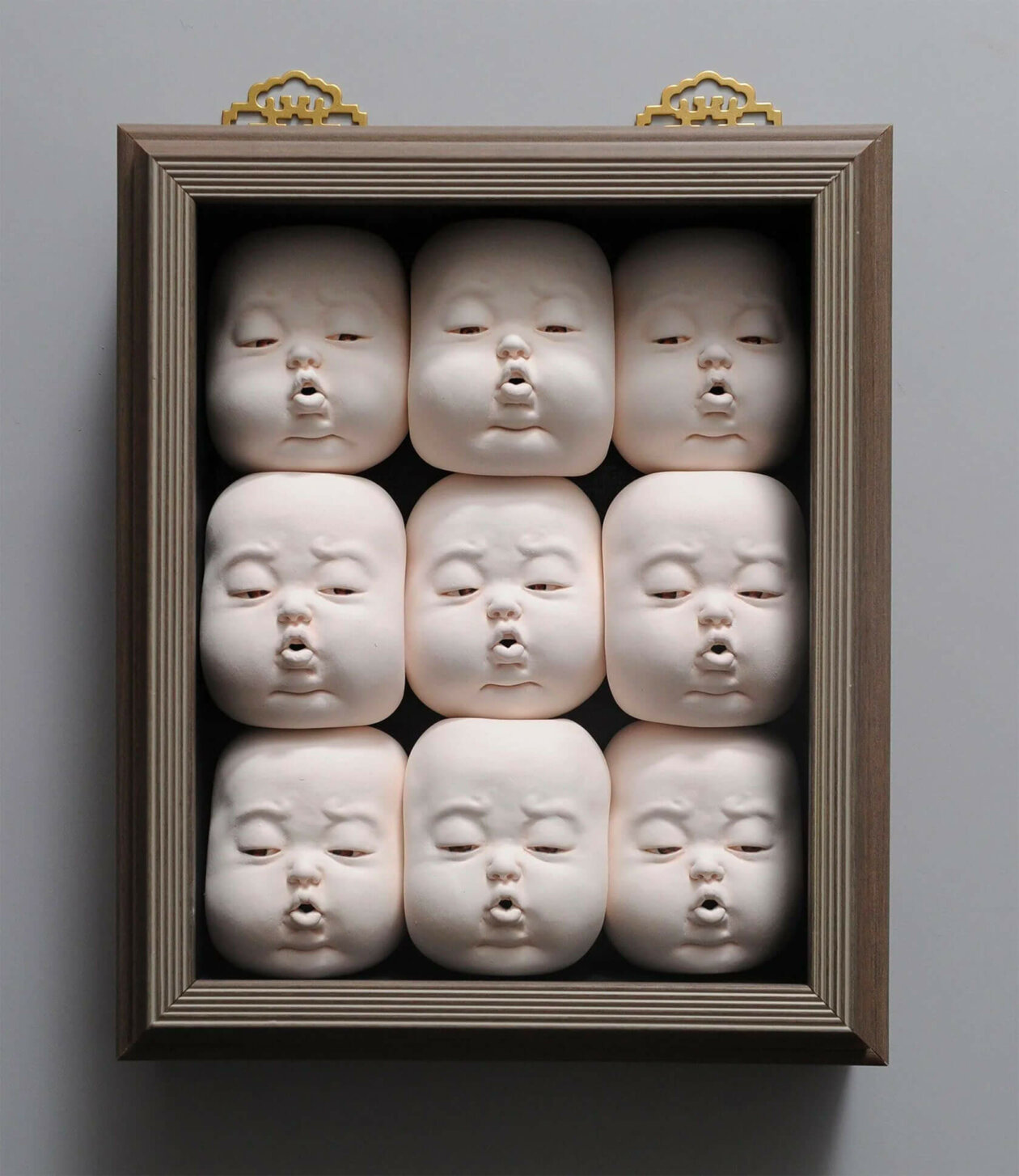 Distorted Baby Faces, Surreal Ceramic Sculptures By Johnson Tsang (24)