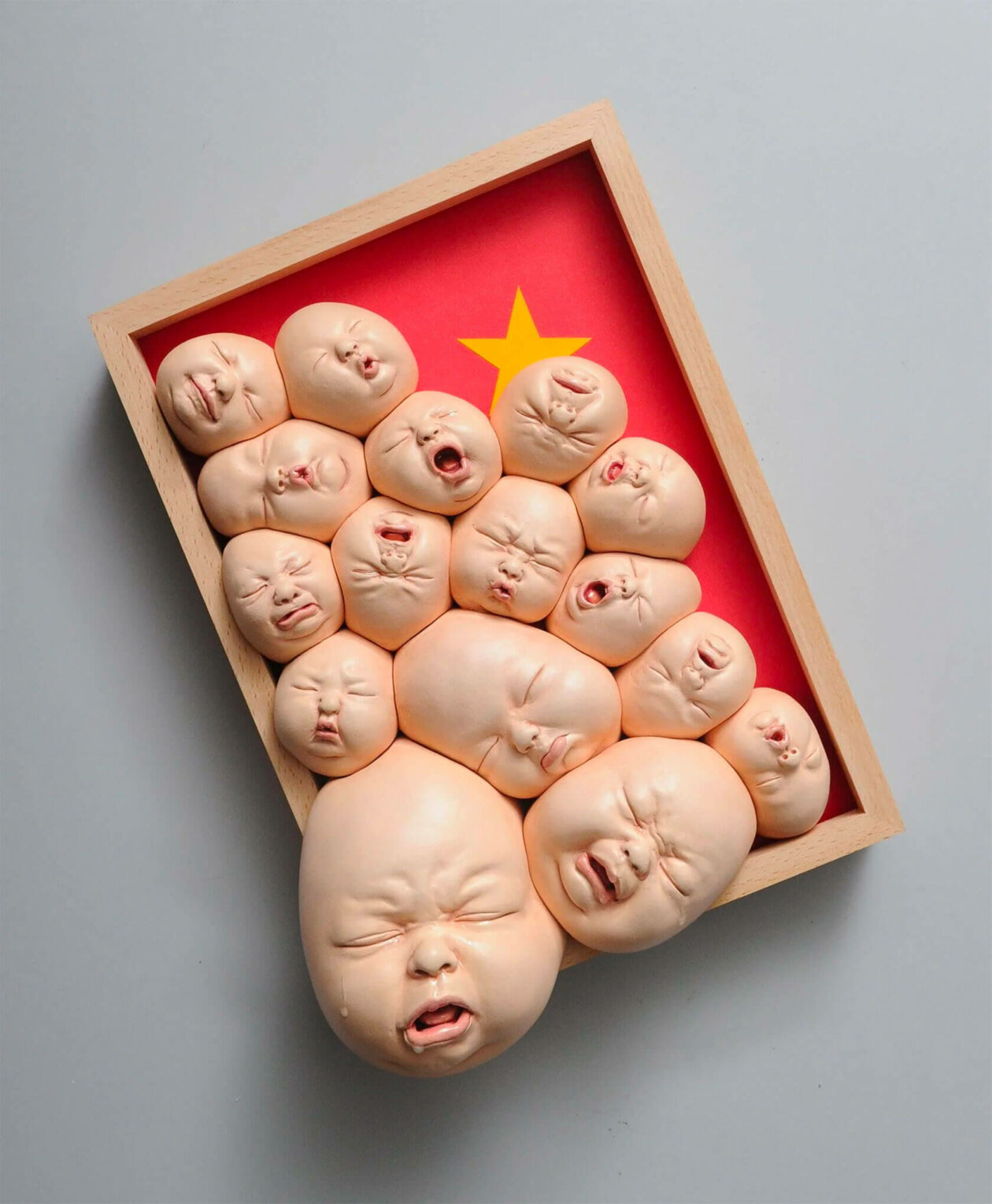 Distorted Baby Faces, Surreal Ceramic Sculptures By Johnson Tsang (25)