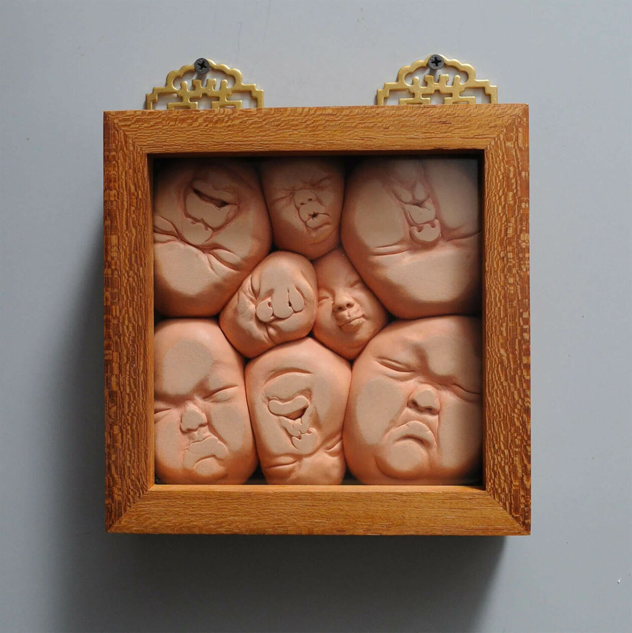 Distorted Baby Faces, Surreal Ceramic Sculptures By Johnson Tsang (27)