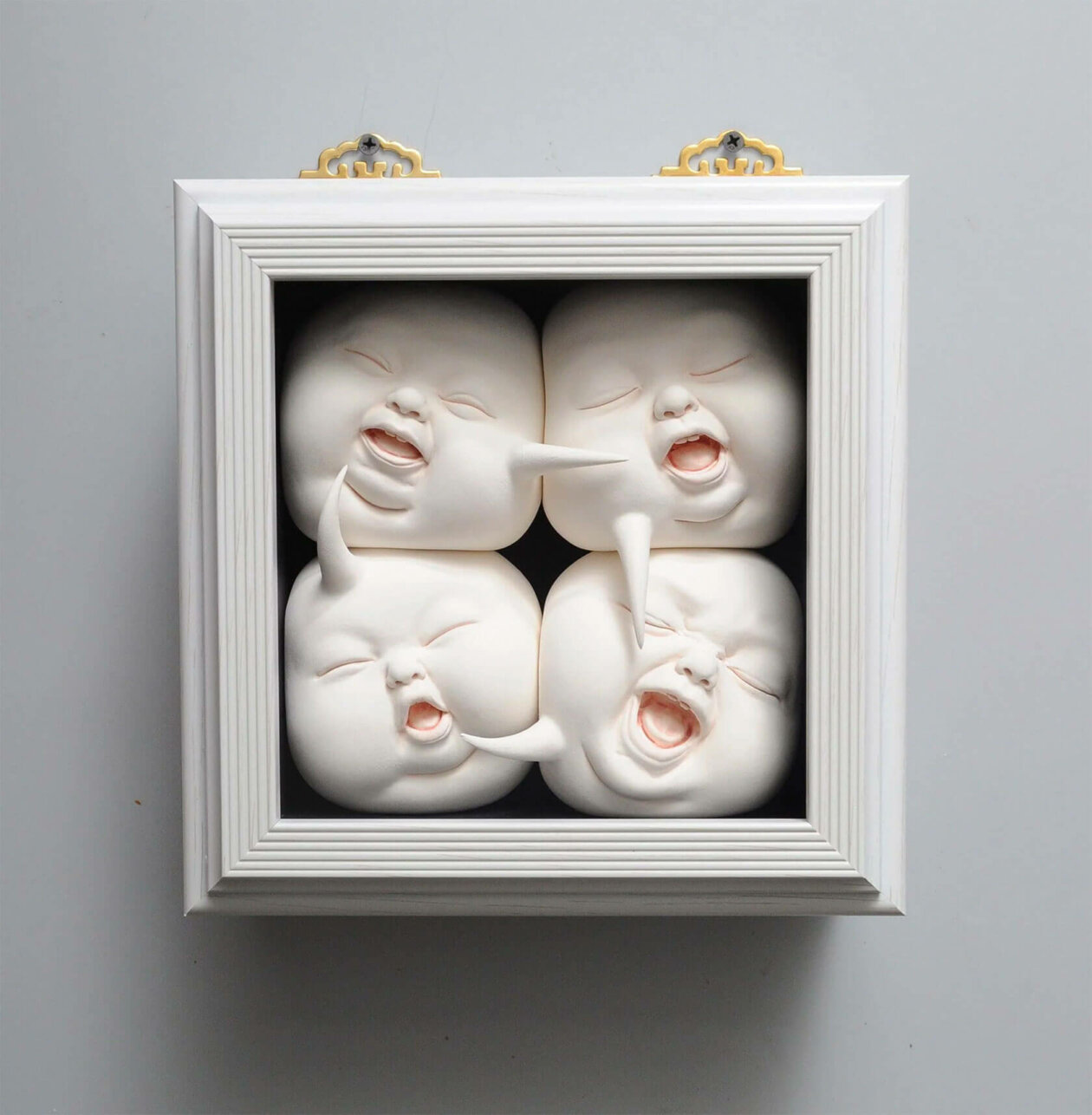 Distorted Baby Faces, Surreal Ceramic Sculptures By Johnson Tsang (29)