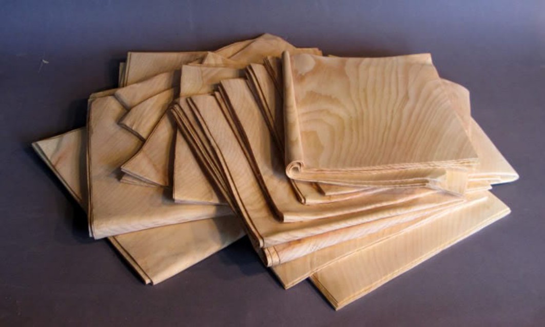 Humorous Hyper Realistic Stacks Of Old Newspapers, Cash, And Comic Books Carved From A Single Piece Of Wood By Randall Rosenthal (2)