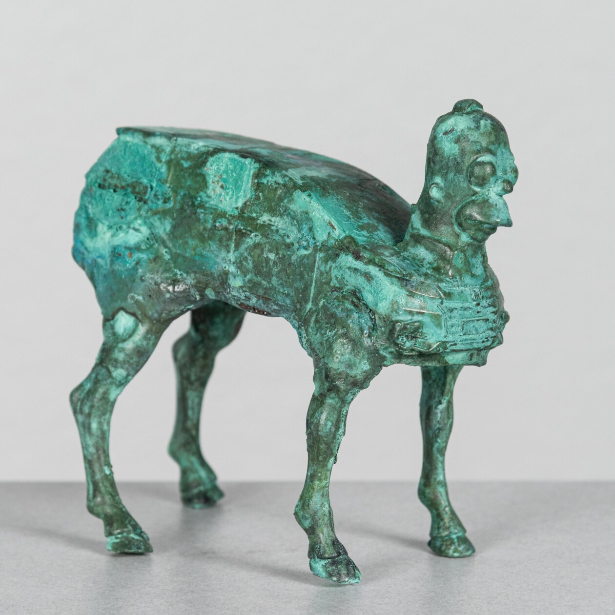 Joshua Goode Blends Ancient Relics With Pop Culture Icons In His Anachronistic Sculptures (9)